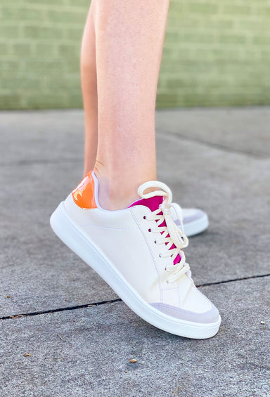 Miel Sneaker in Fuchsia, cream shoes with fuchsia pink tongue and bright orange back
