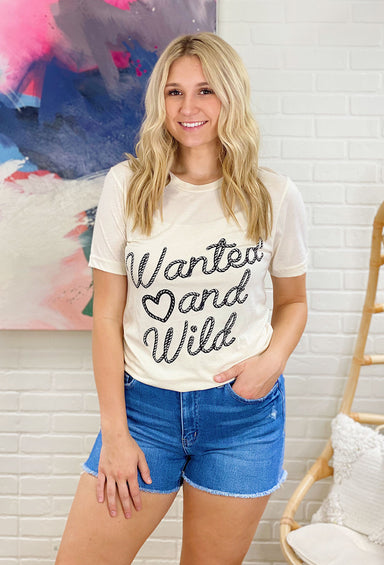 Wanted And Wild Graphic Tee, tan shirt, crewneck, wanted and wild written in rope on front of shirt